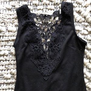 Little black dress with lace cleavage